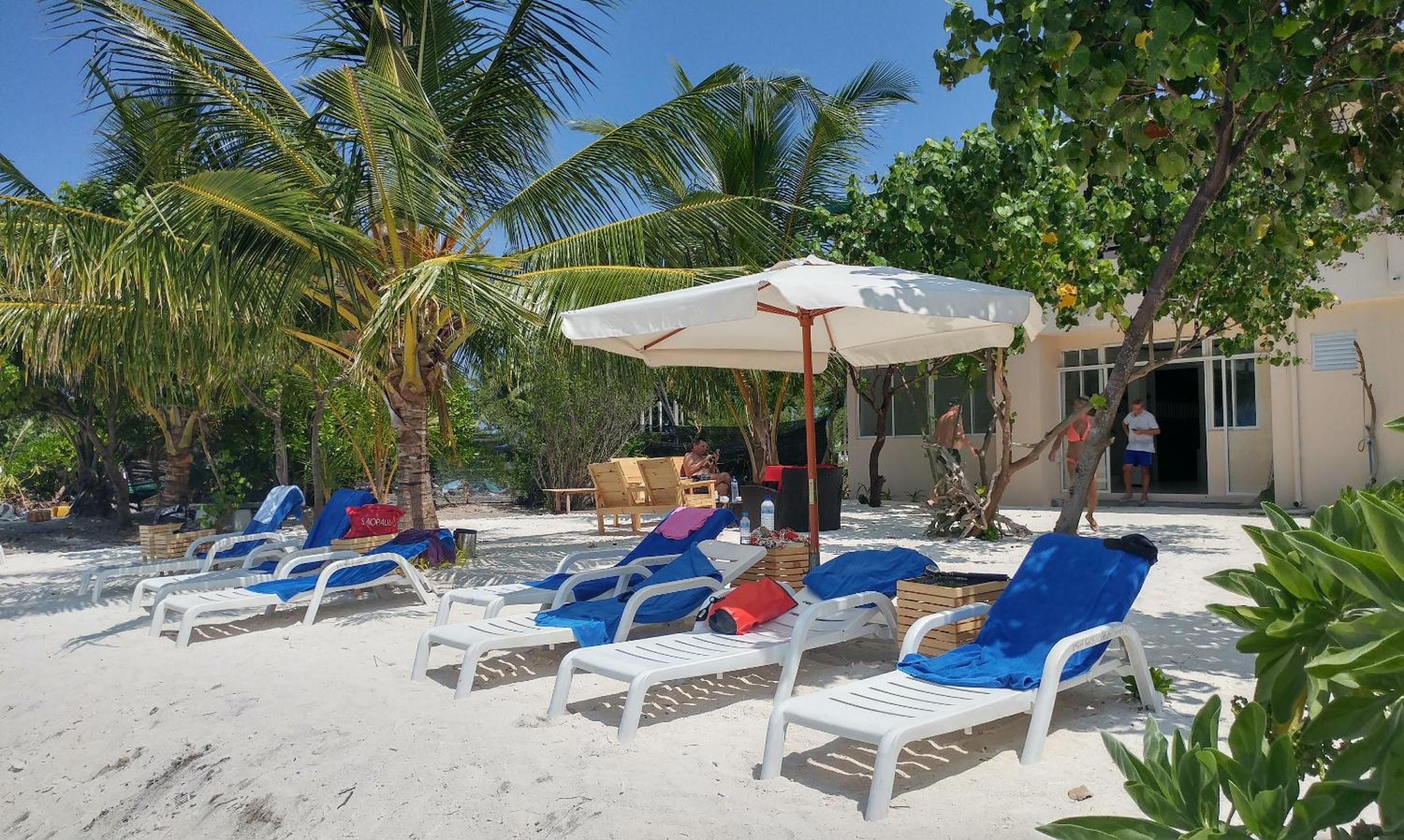 Private beach, white sand, beach umbrellas, beach towels