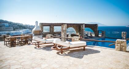 Natural Stone Villa has amazing view in town and aegean private pool free park
