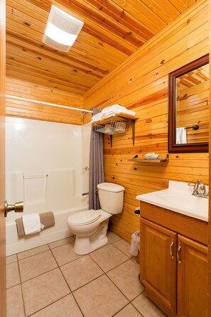 Combined shower/bathtub, hair dryer, towels, soap