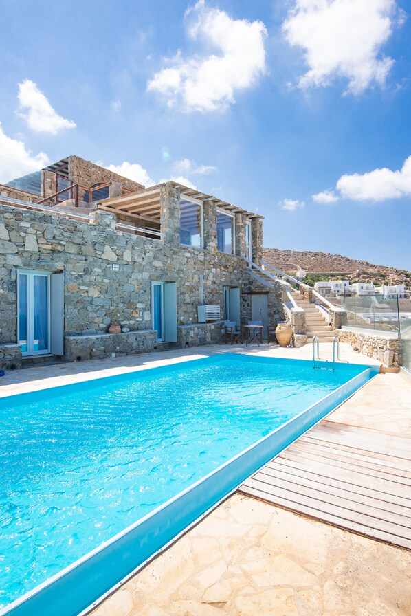 Outdoor pool - Natural Stone Villa has amazing view in town and aegean private pool free park (C8M8+P2 Mykonos, Greece)