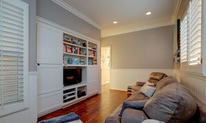 TV, fireplace, books, stereo