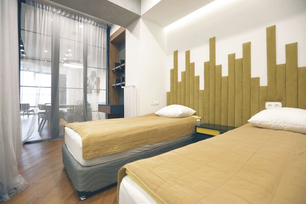 2 bedrooms, desk, iron/ironing board, travel cot