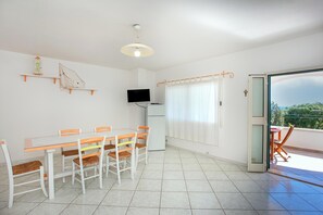 Dining - Holiday Apartment ‘Villa Mula 4’ with Sea View, Wi-Fi, Terrace & Shared Pool; Parking Available (Orosei)
