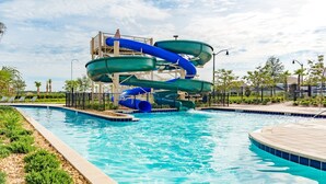 A water park with multiple slides and a pool. - Beautiful 5 Star Townhome on Storey Lake Resort with Private Pool, Orlando Townhome 5020 (Orlando)
