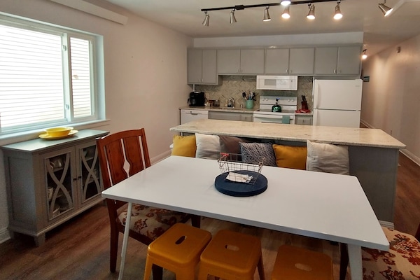Looking into the kitchen and dining area.