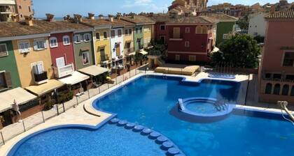 Modern beachside apartment a few minutes walk from shops, bars and restaurants.