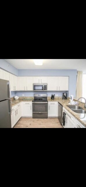 Full-sized fridge, microwave, dishwasher, blender