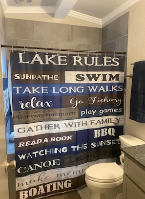 Combined shower/tub, hair dryer, towels, soap