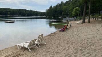 On the beach, sun-loungers, beach towels
