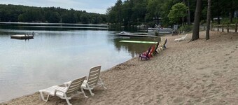 NEWLY RENOVATED! Large sandy beach & swim area. Cute 3 bedroom lake house