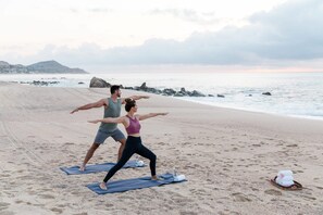 On the beach, sun loungers, beach towels