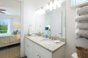 Bathtub, hair dryer, towels, soap