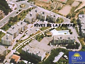 An aerial view of the Rives de La Faviere residential area with labeled buildings.