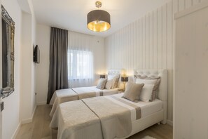 4 habitaciones, caja de seguridad en la habitación y escritorio