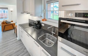 Fridge, microwave, dishwasher, coffee/tea maker