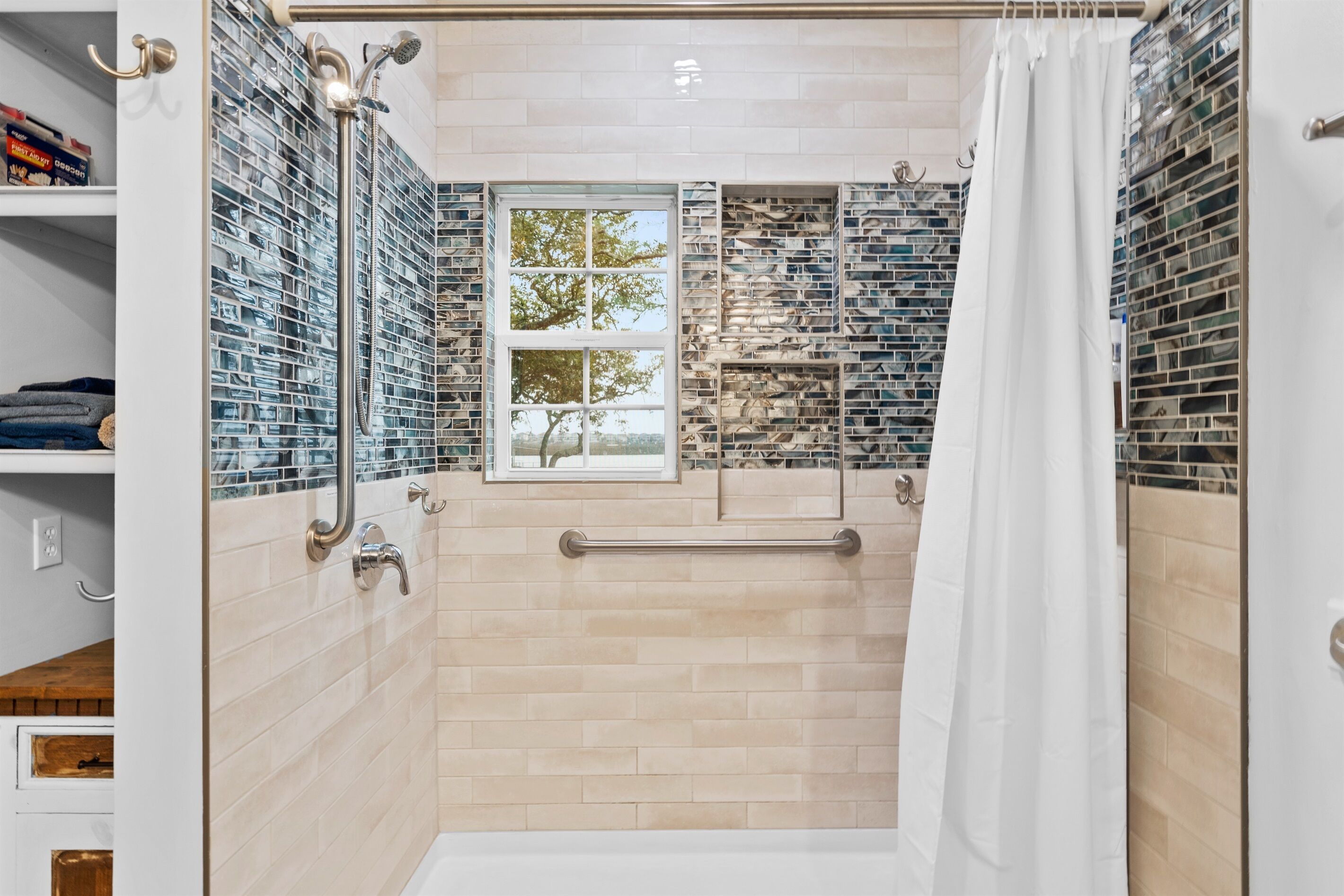 Shower, hair dryer, towels