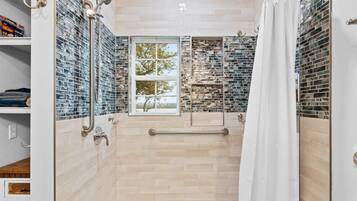 Shower, hair dryer, towels