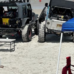 On the beach, sun-loungers