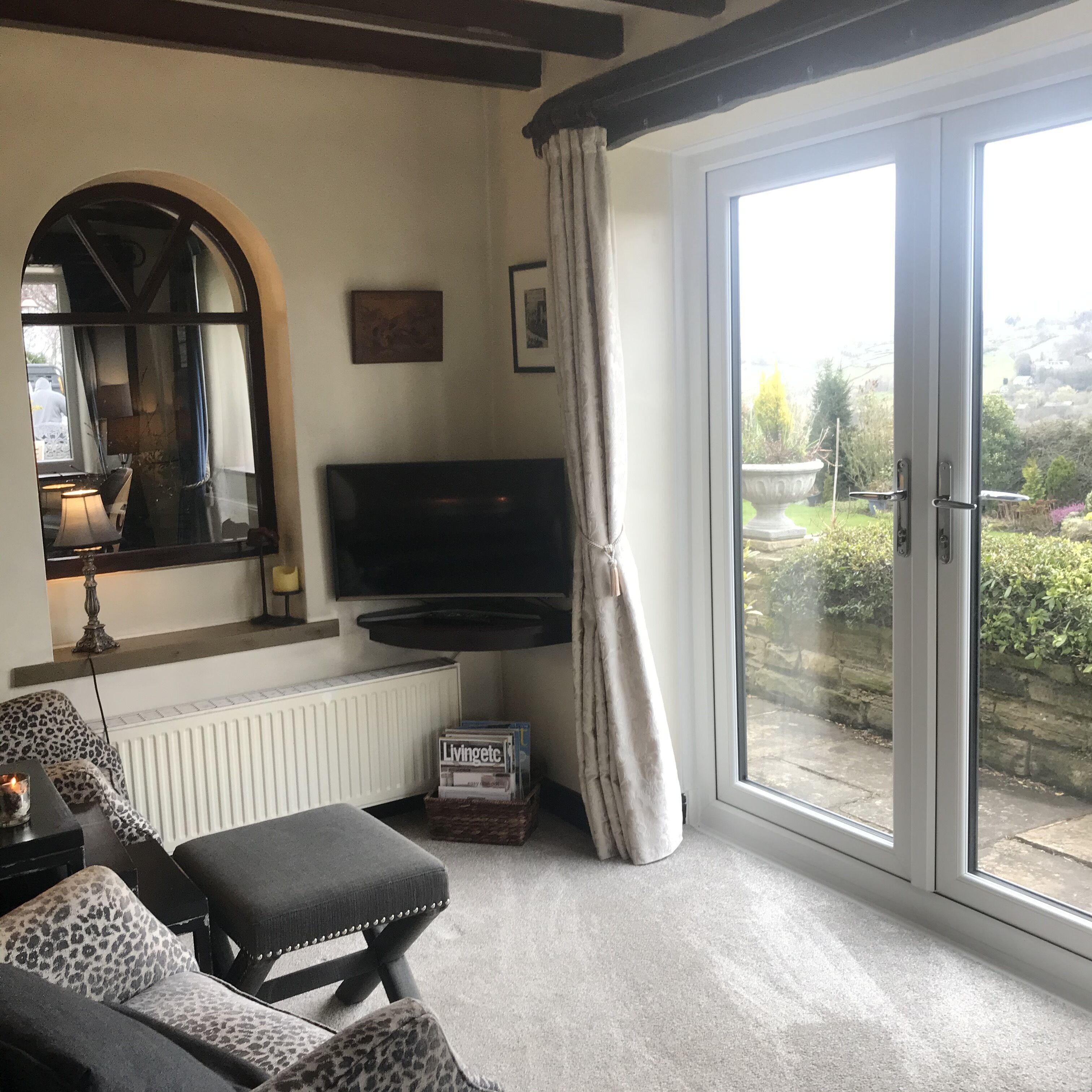 Smart TV, fireplace, books, printers