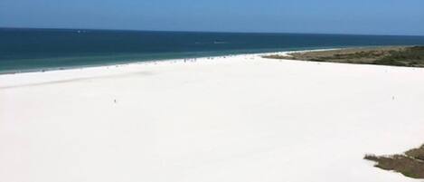 On the beach, sun-loungers, beach towels