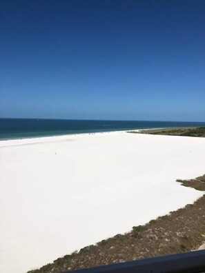 On the beach, sun loungers, beach towels