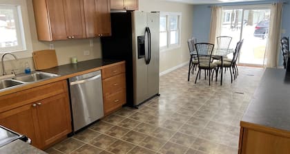 Silver Lake Cottage. 1 Mile from Sand Dunes. Quiet Street. Sleeps 12-14.