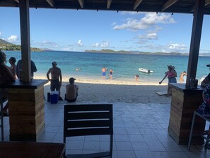 On the beach, sun-loungers, beach towels