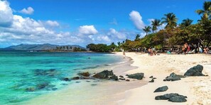 On the beach, sun-loungers, beach towels