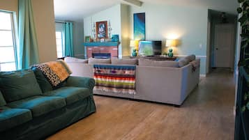 Smart TV, fireplace, DVD player, books