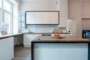 Apartment, Multiple Beds | Private kitchen | Fridge, oven, stovetop, dishwasher