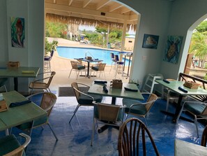 Outdoor dining - Amazing new/modern condo-Walk to beach, Marina and pools. Red Hook/bars near by! (St Thomas)
