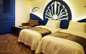 A hotel room with two beds, a sofa, and a decorative headboard. - Dongtan Windsor Hotel (Hwaseong)