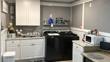 Microwave, coffee/tea maker, cookware/dishes/utensils