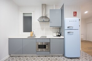 Departamento, 1 habitación | Cocina privada | Horno, lavavajillas, cafetera y tetera y tostadora 