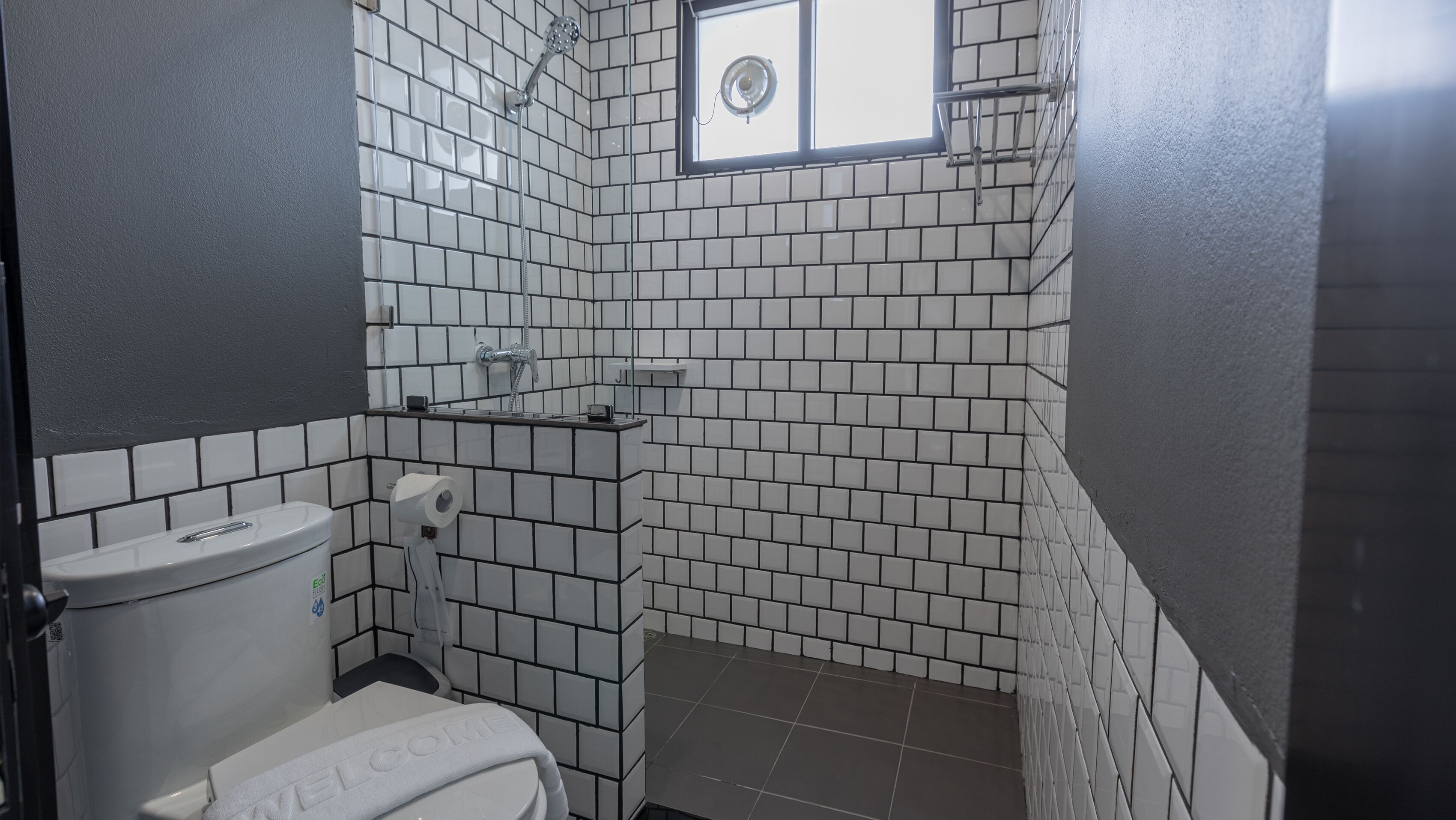 shower, rainfall showerhead, hair dryer, towels