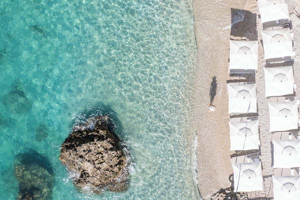 Private beach nearby, free beach shuttle, beach umbrellas, beach towels