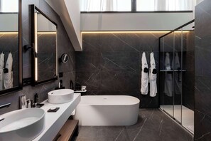 Junior Suite | Bathroom | Rainfall showerhead, hair dryer, bathrobes, slippers