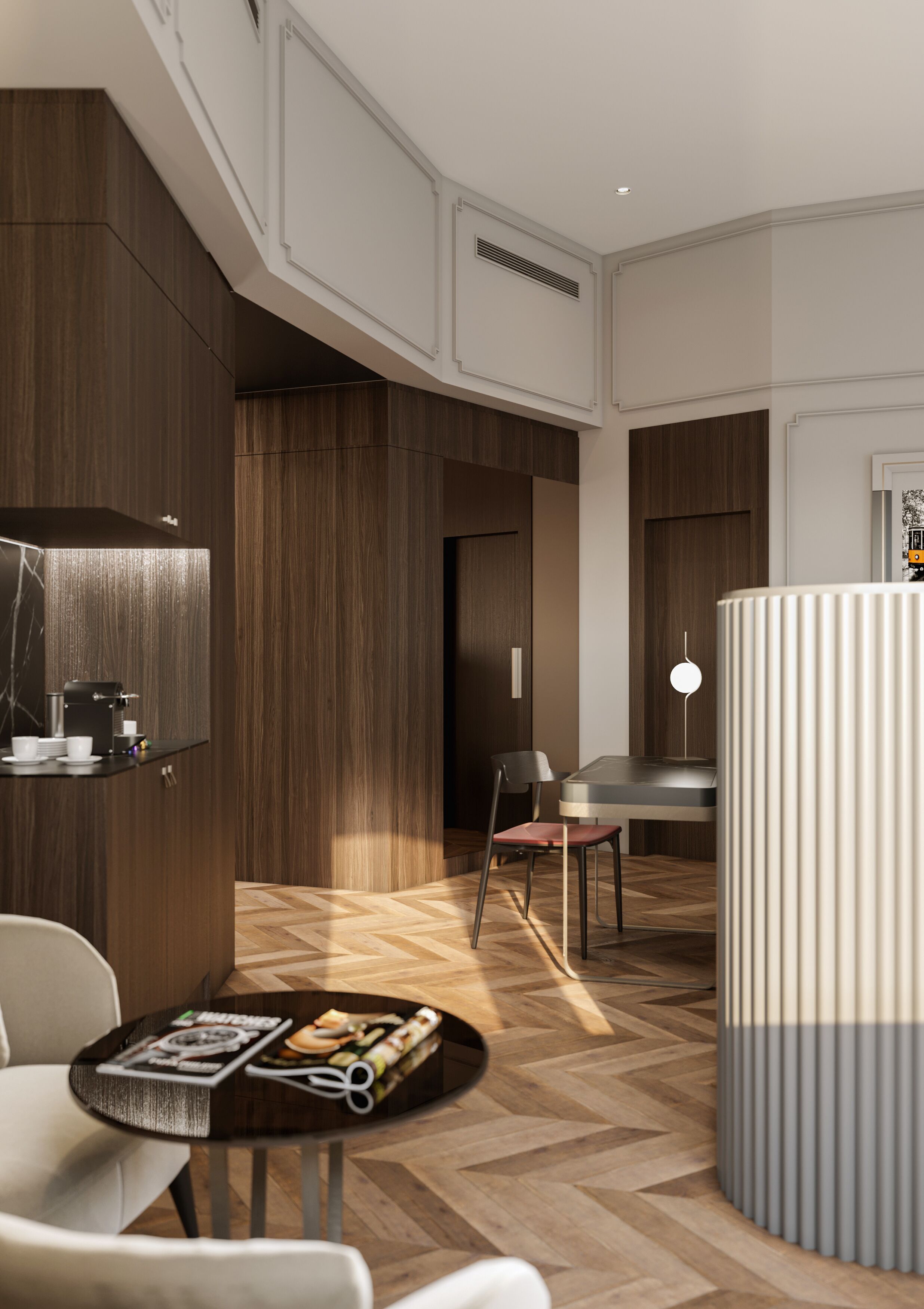 Une chambre d’hôtel moderne avec un plancher en bois, une table ronde avec des magazines, une machine à café et un coin salon avec des fauteuils.