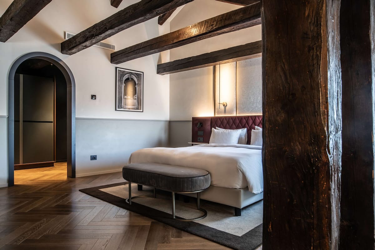Suite junior | 1 habitación, ropa de cama de alta calidad y edredón