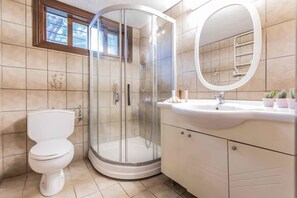 Bathtub, hair dryer, towels