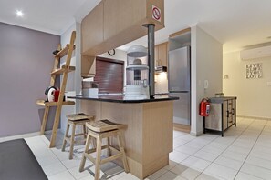 Basic Townhome | Living area | Flat-screen TV - Island View 65 (Cape Town)