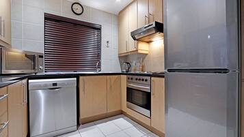 Basic Townhome | Living area | Flat-screen TV