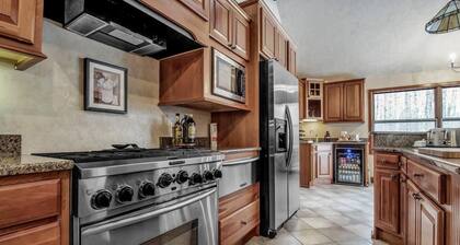 Best of both worlds; chalet located on a private lot in the pines and only 1 miles from the village!
