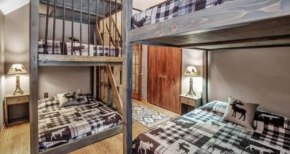 Best of both worlds; chalet located on a private lot in the pines and only 1 miles from the village!