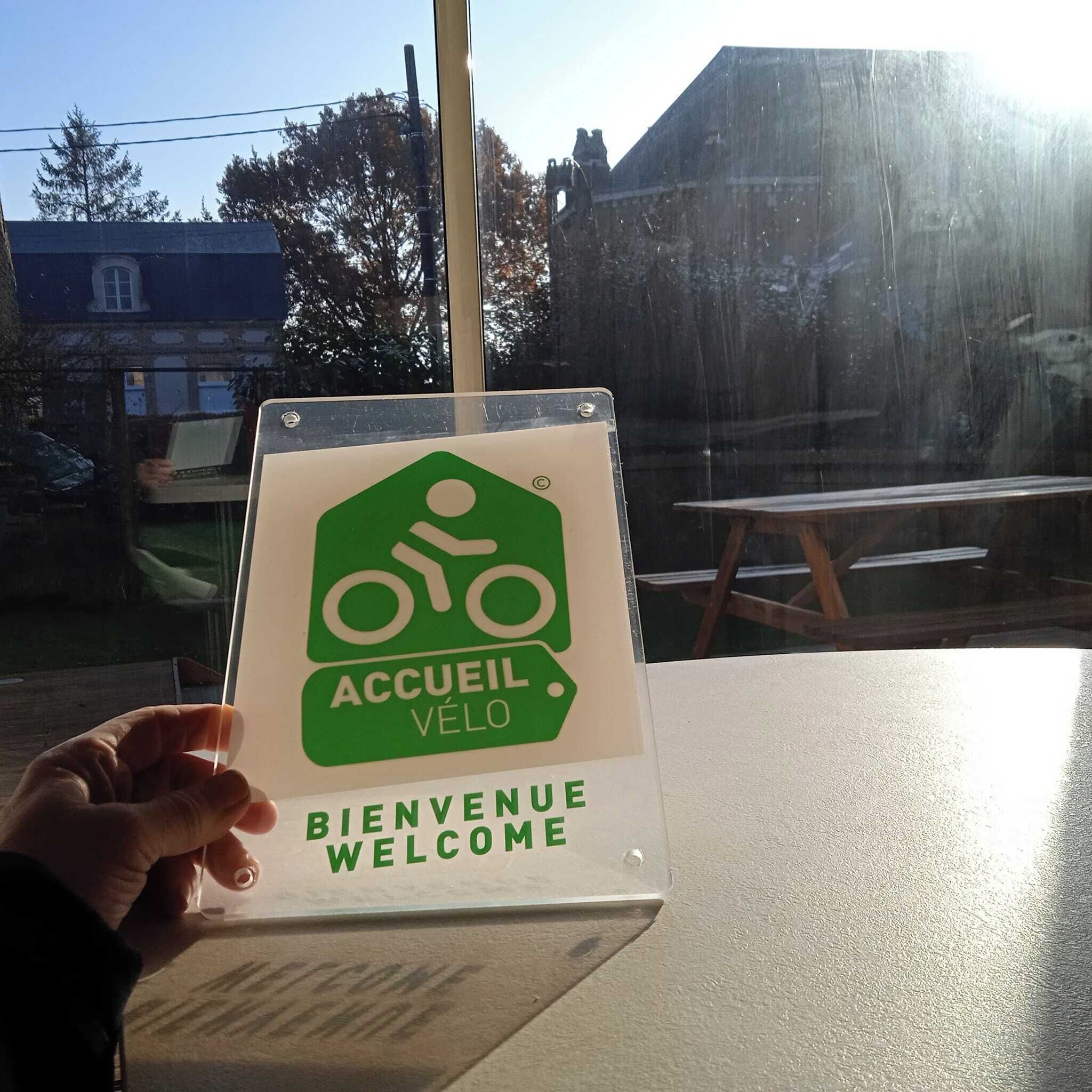A welcome sign for a bike-friendly accommodation.