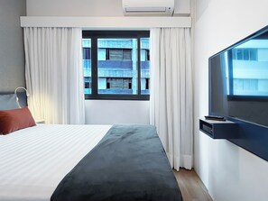 Standard Room, 1 Bedroom | In-room safe, blackout curtains, free WiFi, bed sheets - Apartamento Conforto - Itaim Bibi (São Paulo)