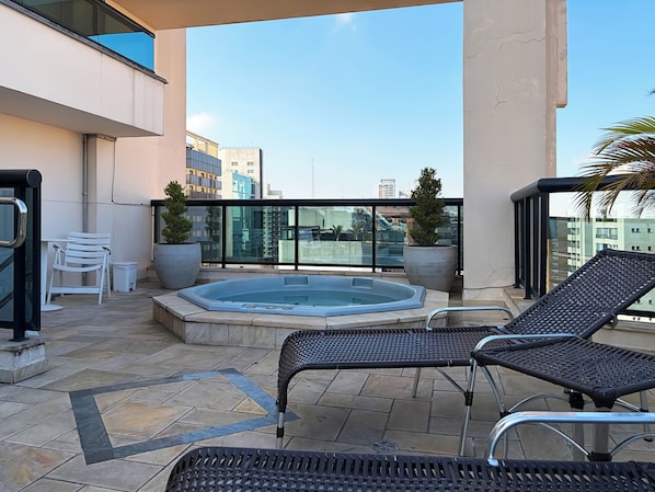 Outdoor pool, open 8:00 AM to 10:00 PM, sun loungers