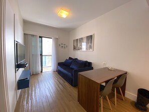 Standard Room, 1 Bedroom | Living area | 42-inch flat-screen TV with cable channels, TV