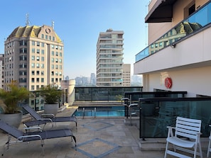 Outdoor pool, open 8:00 AM to 10:00 PM, sun loungers