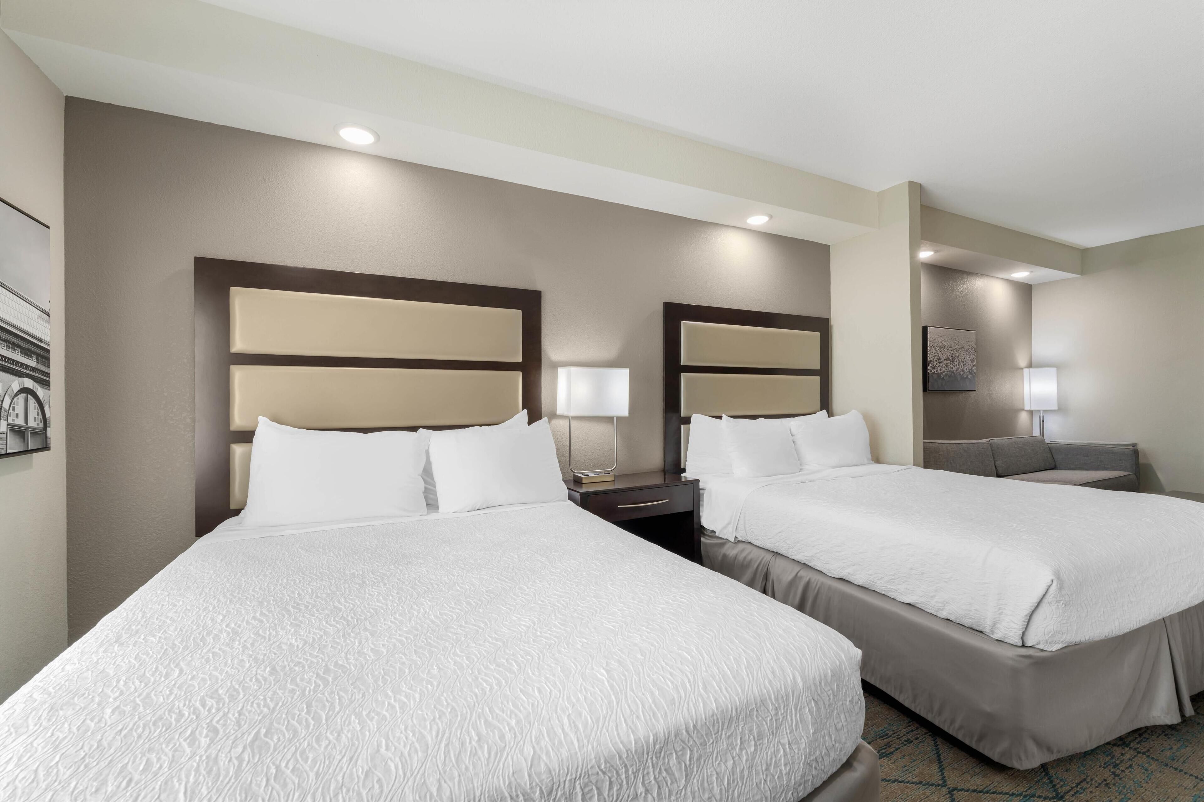 suite, 2 queen beds, accessible, refrigerator & microwave (with sofabed) | 1 bedroom, desk, laptop workspace, iron/ironing board